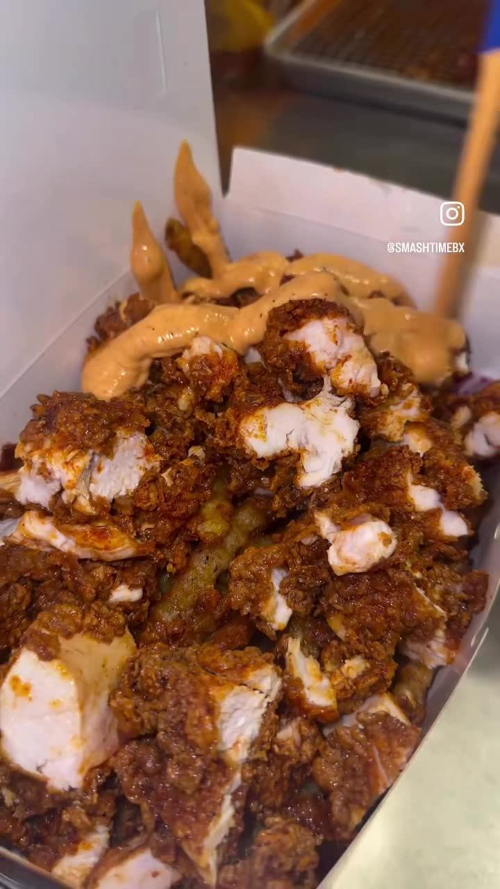Fries loaded with fried chicken and sauce